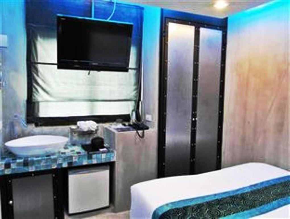 Blutique Hotel Бангкок Номер фото